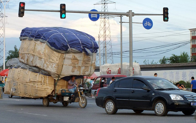 Перегруженные транспортные средства в Китае 